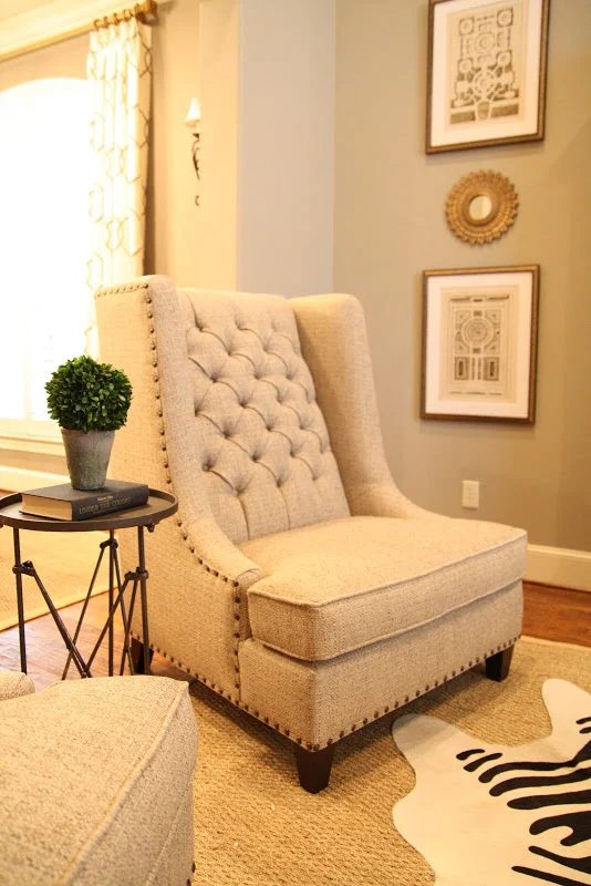 Designing-A-Living-Room-With-Tall-Walls-zebra-pattern-dyed-cow-hide (9)