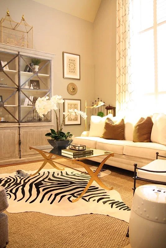 Designing-A-Living-Room-With-Tall-Walls-zebra-pattern-dyed-cow-hide (3)