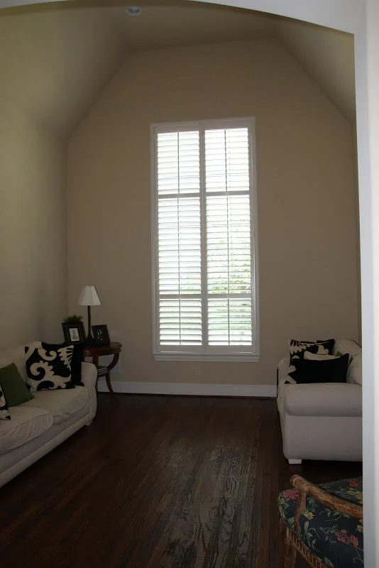 Designing-A-Living-Room-With-Tall-Walls-zebra-pattern-dyed-cow-hide (7)