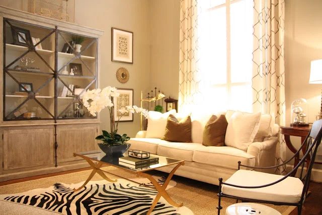 Designing-A-Living-Room-With-Tall-Walls-zebra-pattern-dyed-cow-hide (6)