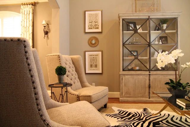 Designing-A-Living-Room-With-Tall-Walls-zebra-pattern-dyed-cow-hide (5)