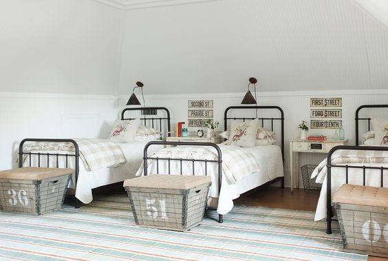 Shared boys room inspiration - not just two but THREE beds, and direct but organized. Love the rug.