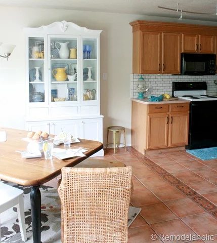 Dining Room updates bamboo shades-bench-wicker chairs white hutch blue and yellow (7)