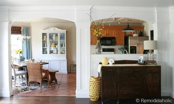 Dining Room updates bamboo shades-bench-wicker chairs white hutch blue and yellow (9)