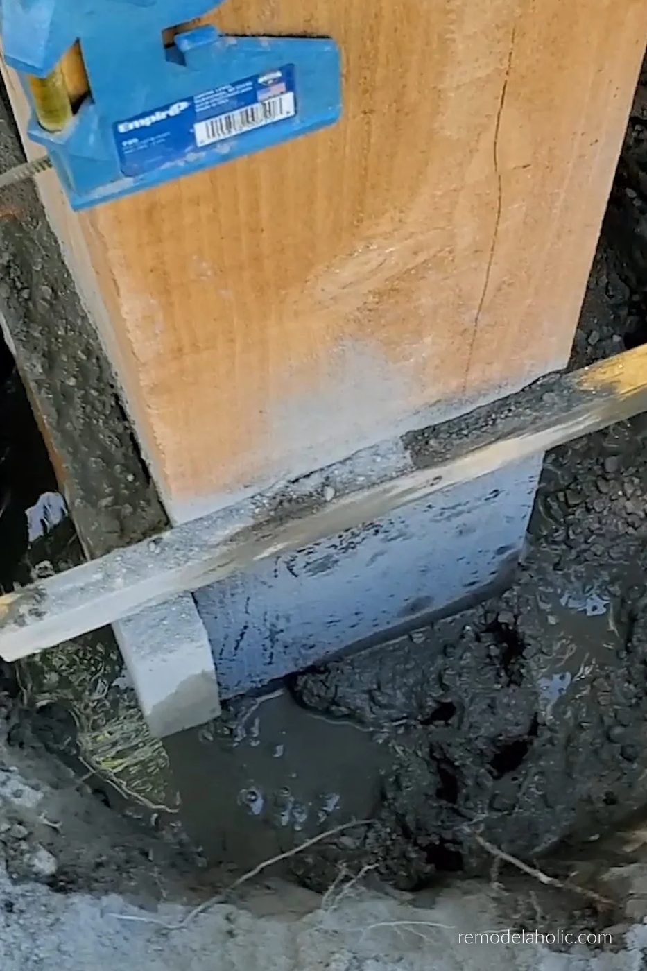 How To Dry Pour A Concrete Post Footing Add Water And Mix Bekob