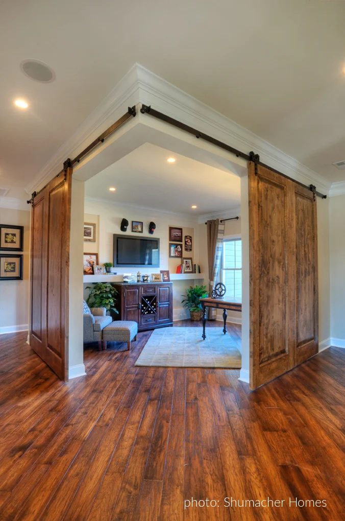Corner Office Or Study Area With Double Sliding Barn Doors By Shumacher Homes (1)