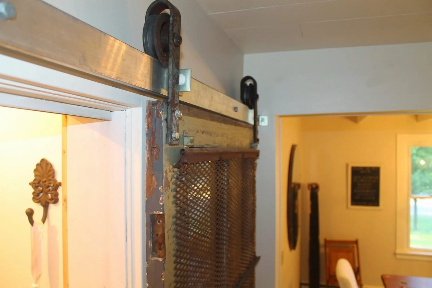 sliding barn door for pantry using old meat hooks, Girl Meets Carpenter on @Bekob