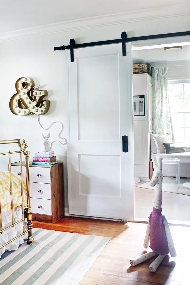 sliding barn door hung using $150 hardware store kit - The Hunted Interior