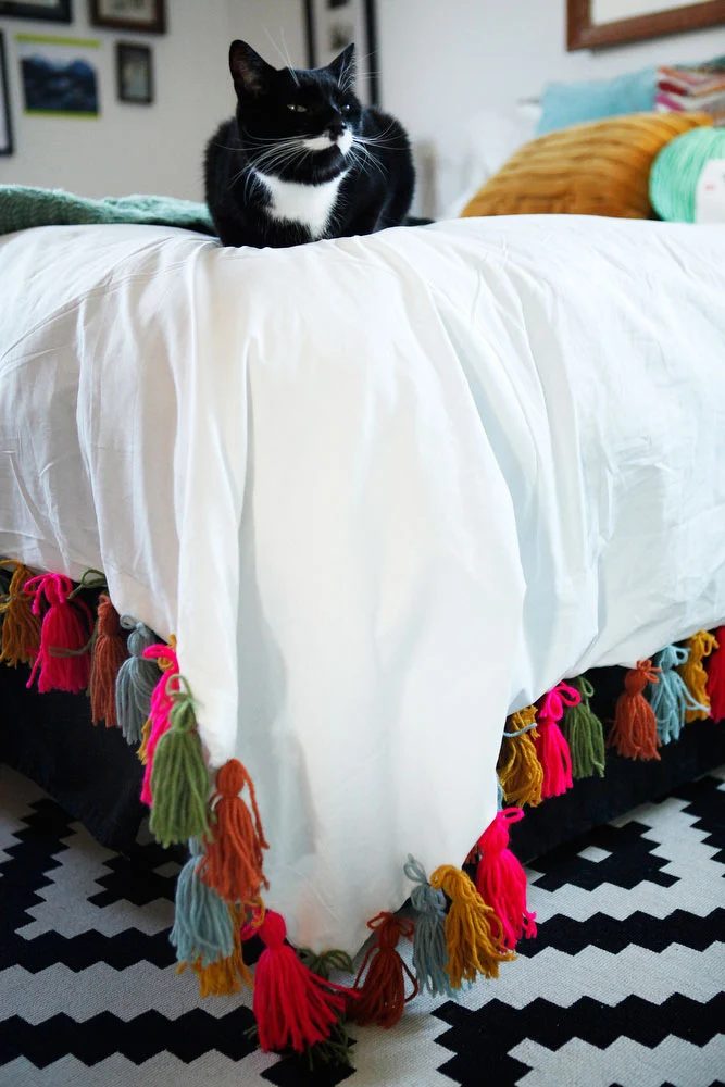 Handmade+yarn+tassel+duvet+blanket+|+www.freckleandfair.com