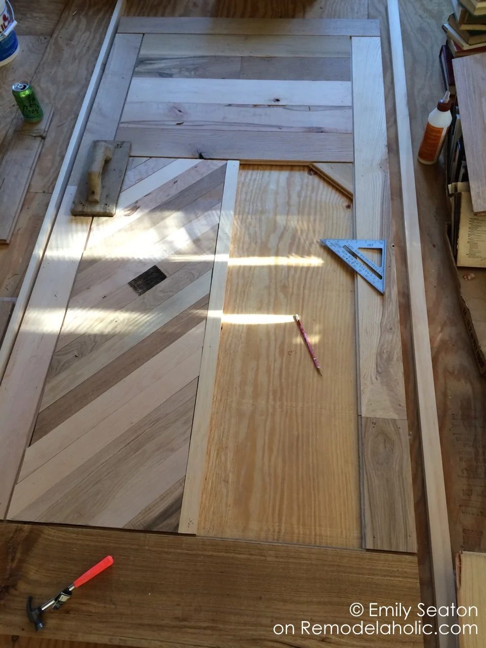 build a wood barn door with chevron pattern, handmade herringbone barn door detail