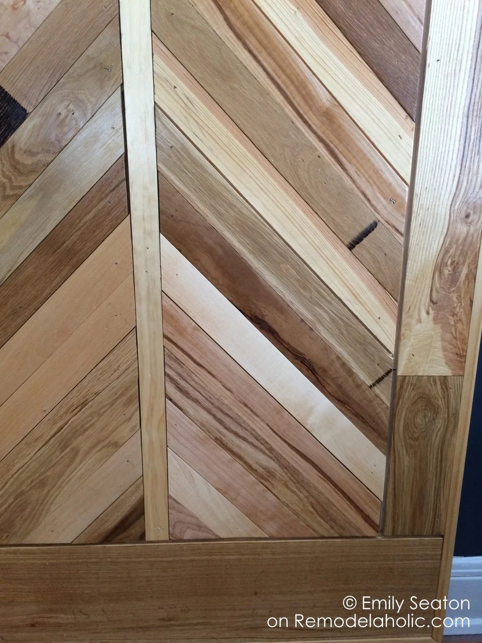 herringbone detail on a wood chevron barn door, handmade woodworking plans