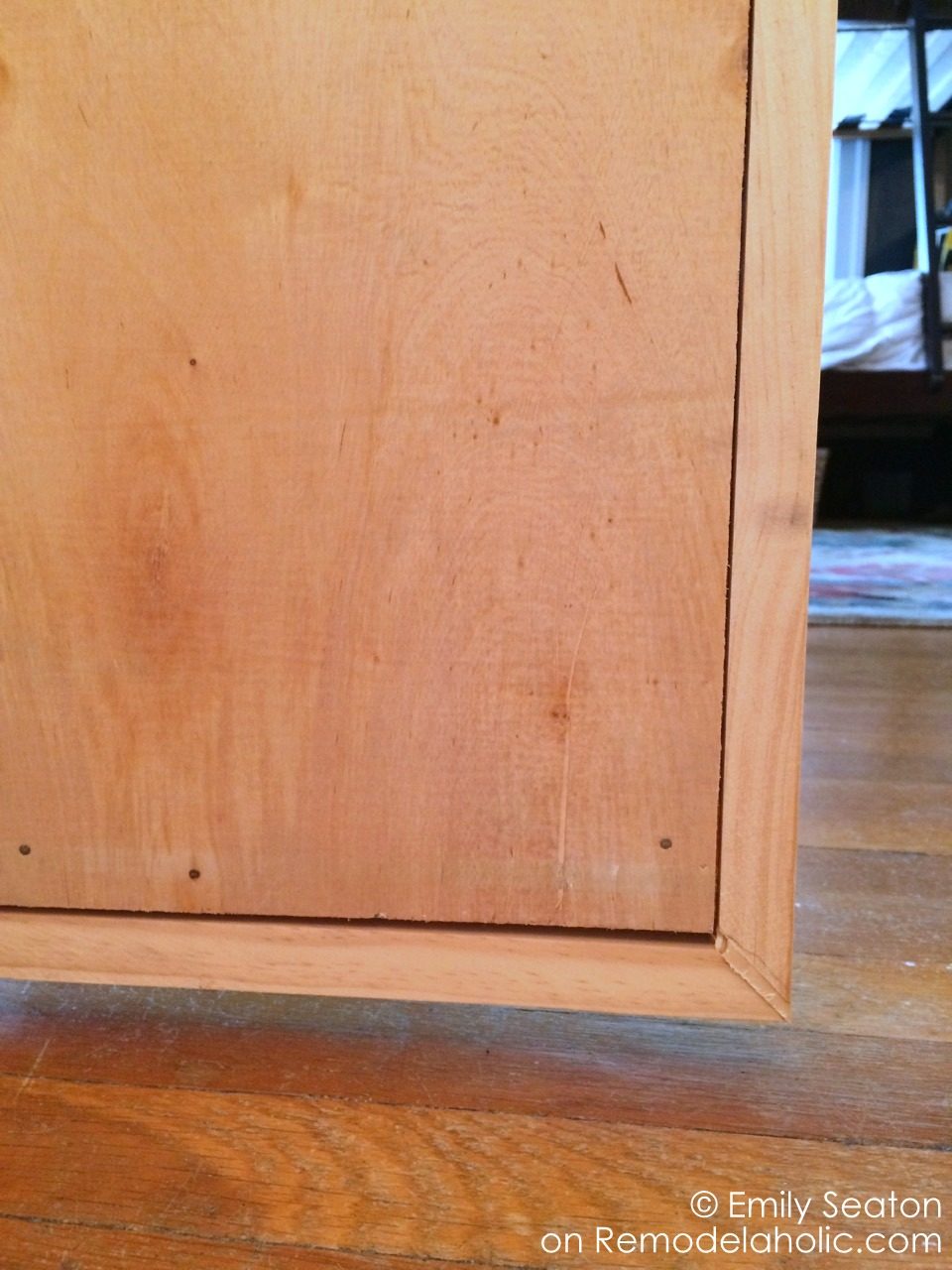 attach wood herringbone barn door back and frame