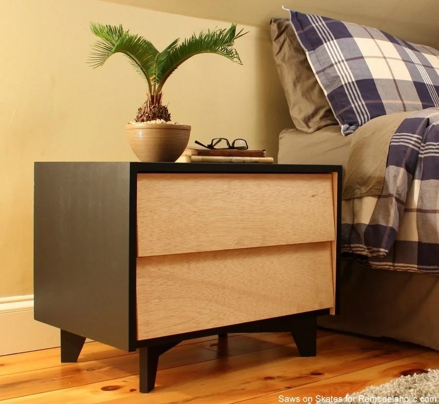 Handmade Mid-Century Modern Nightstand | Free building plans and walkthrough, including how to make the legs, slanted drawer fronts, and Handmade drawer slides. walkthrough from Sa