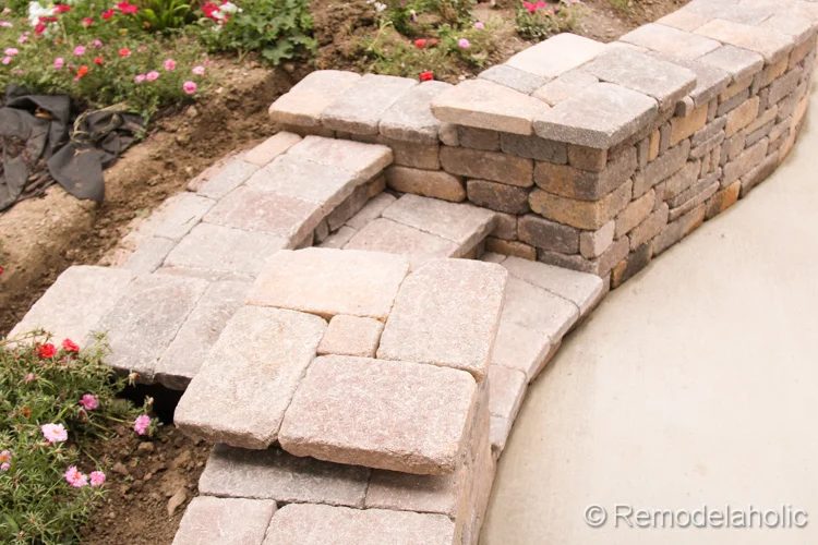 How to build a retaining wall with steps and platforms for flower pots, from Bekob