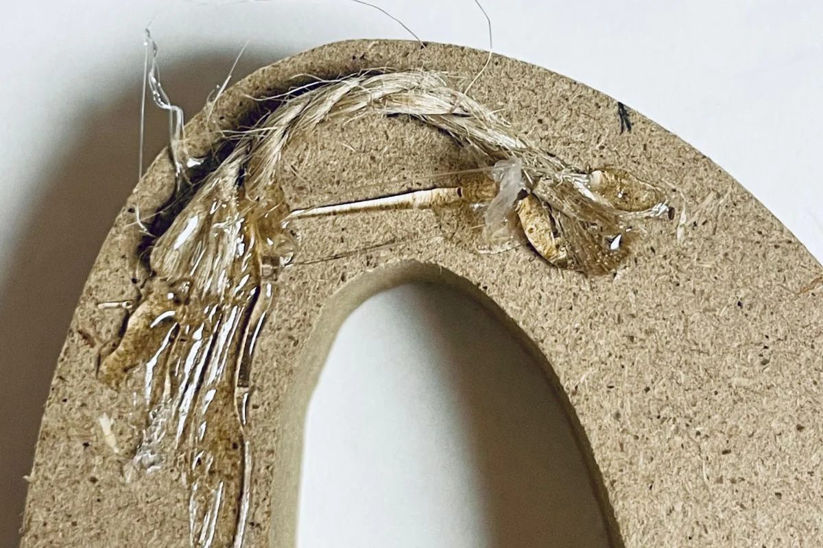 straightforward Handmade Dollar Tree Hello Wreath walkthrough (2) Glue Twine To Wood Cutout, Bekob