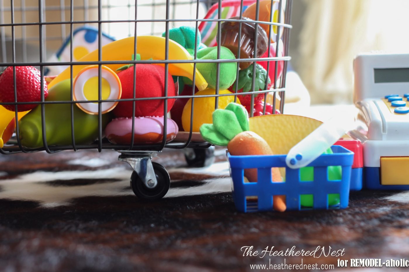 rolling wire bin for toy storage - The Heathered Nest on @Bekob