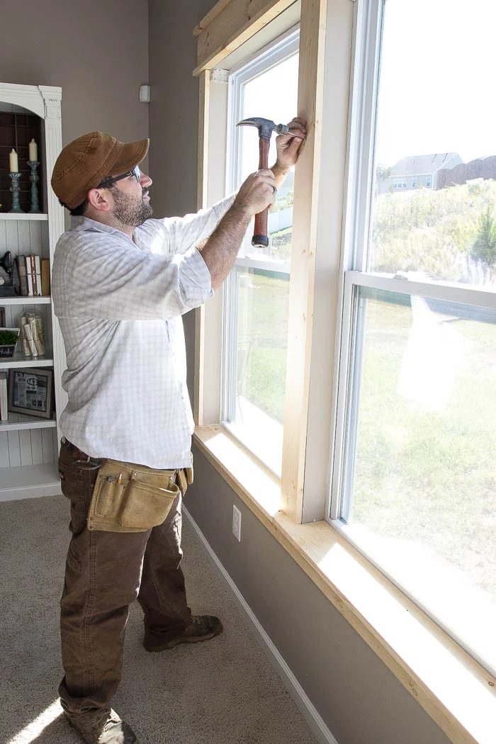 Adding Handmade window trim for a craftsman look featured on Bekob.com