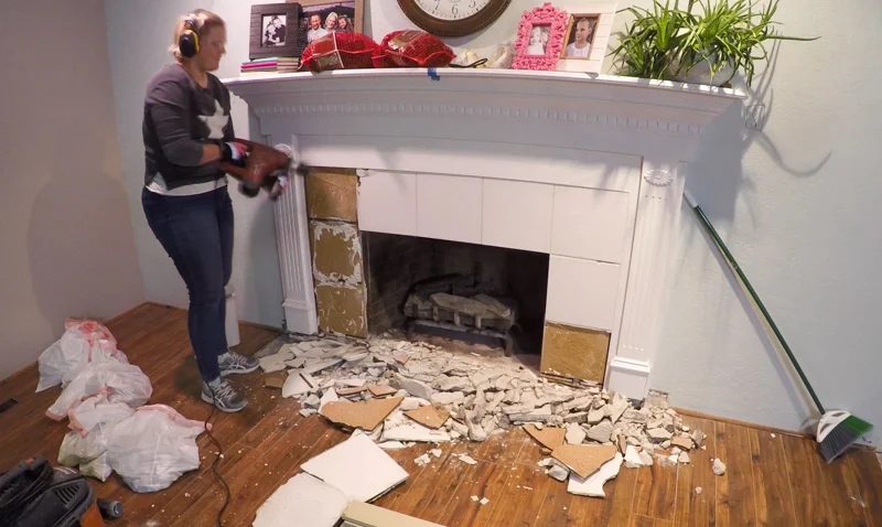 removing tile from a fireplace surround with a hammer drill