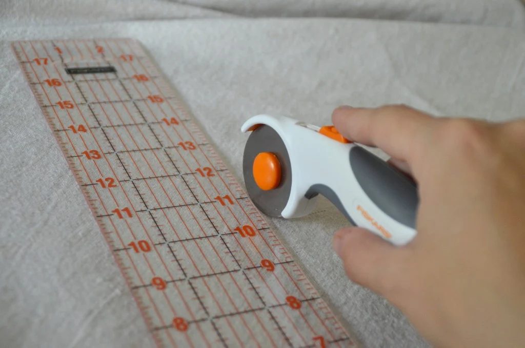 use a drop cloth to make a copycat Land of Nod floor pouf, featured on Bekob.com