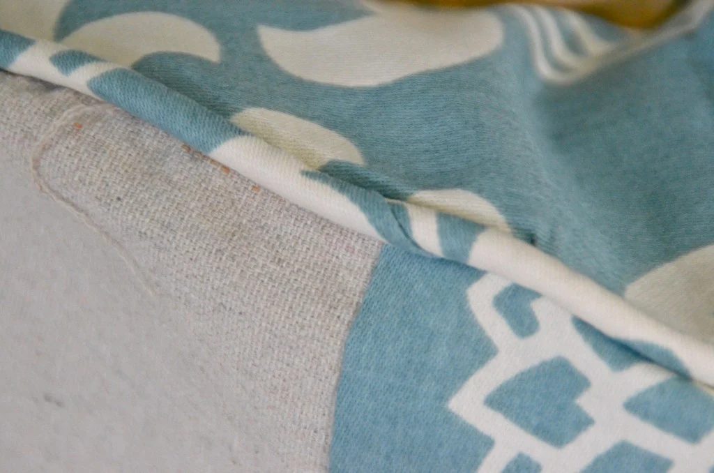 piping detail on Land of Nod floor cushion copycat, featured on Bekob.com