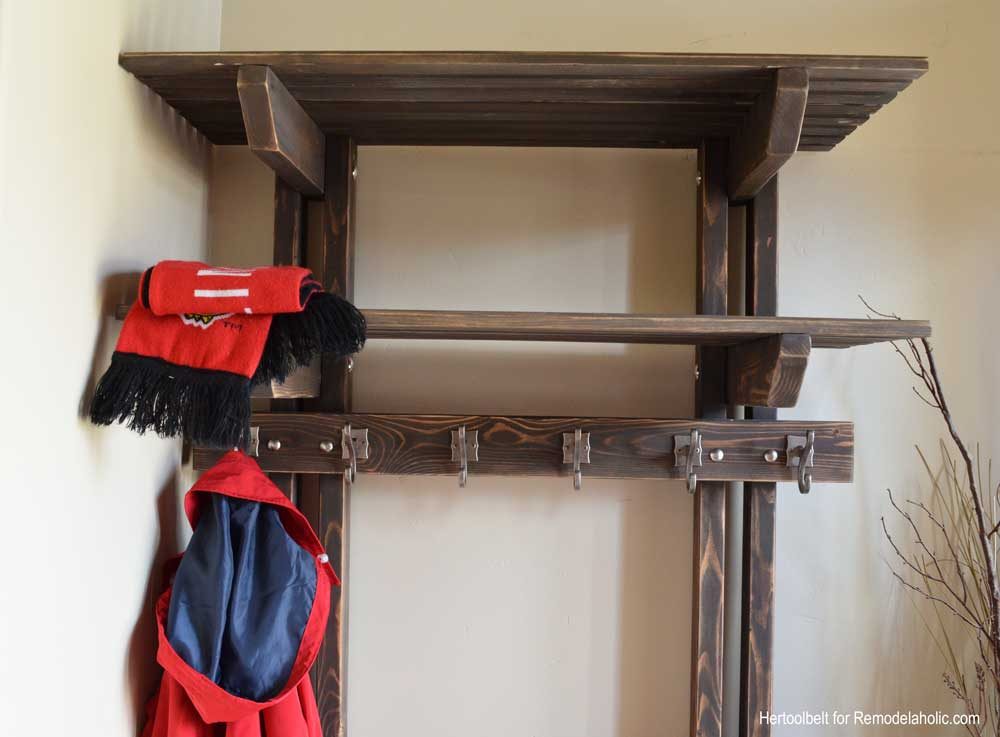 Building extra storage for your coats is straightforward with this free plan for a Handmade hall tree coat rack.
