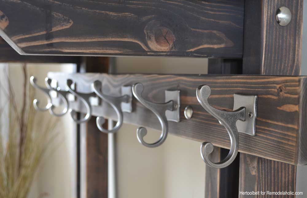 Building extra storage for your coats is straightforward with this free plan for a Handmade hall tree coat rack.
