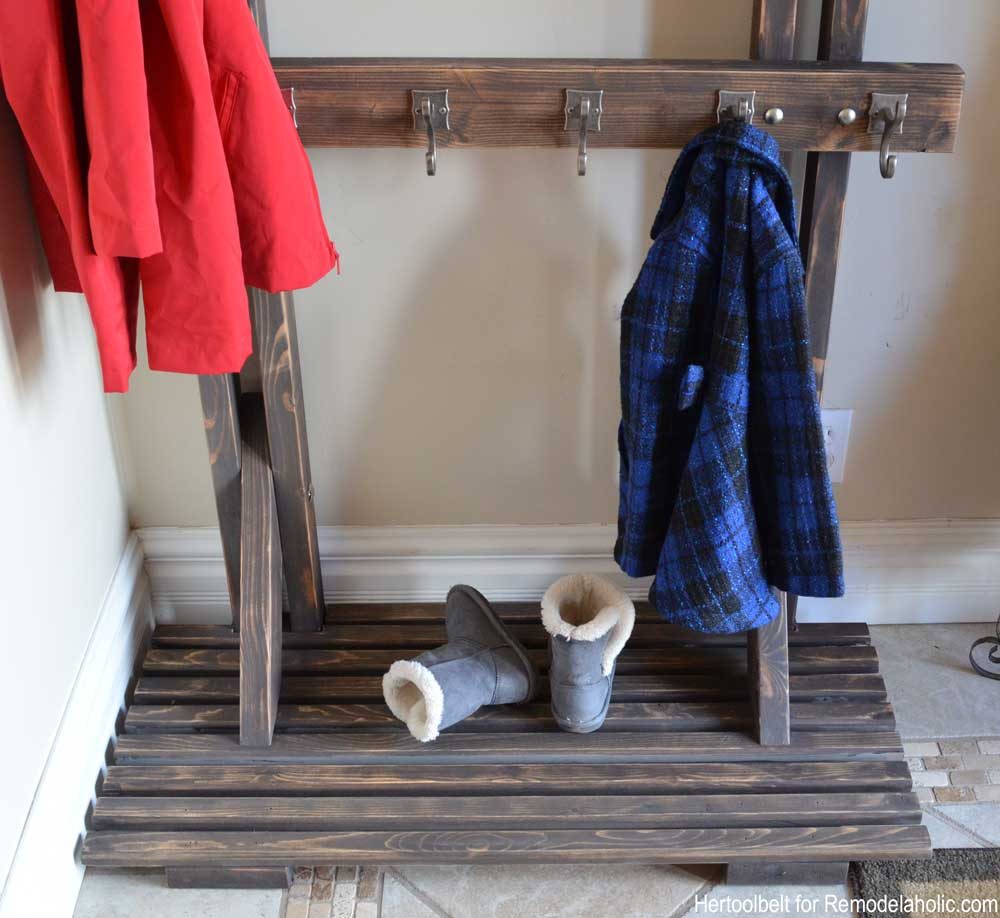 Building extra storage for your coats is straightforward with this free plan for a Handmade hall tree coat rack.