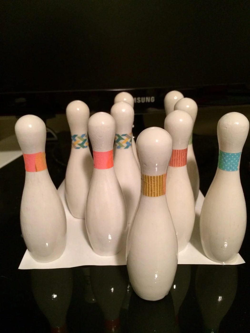 5 Hand painted bowling pins with washi tape for kid-sized bowling lane, Handmade by Ashley featured on @Bekob