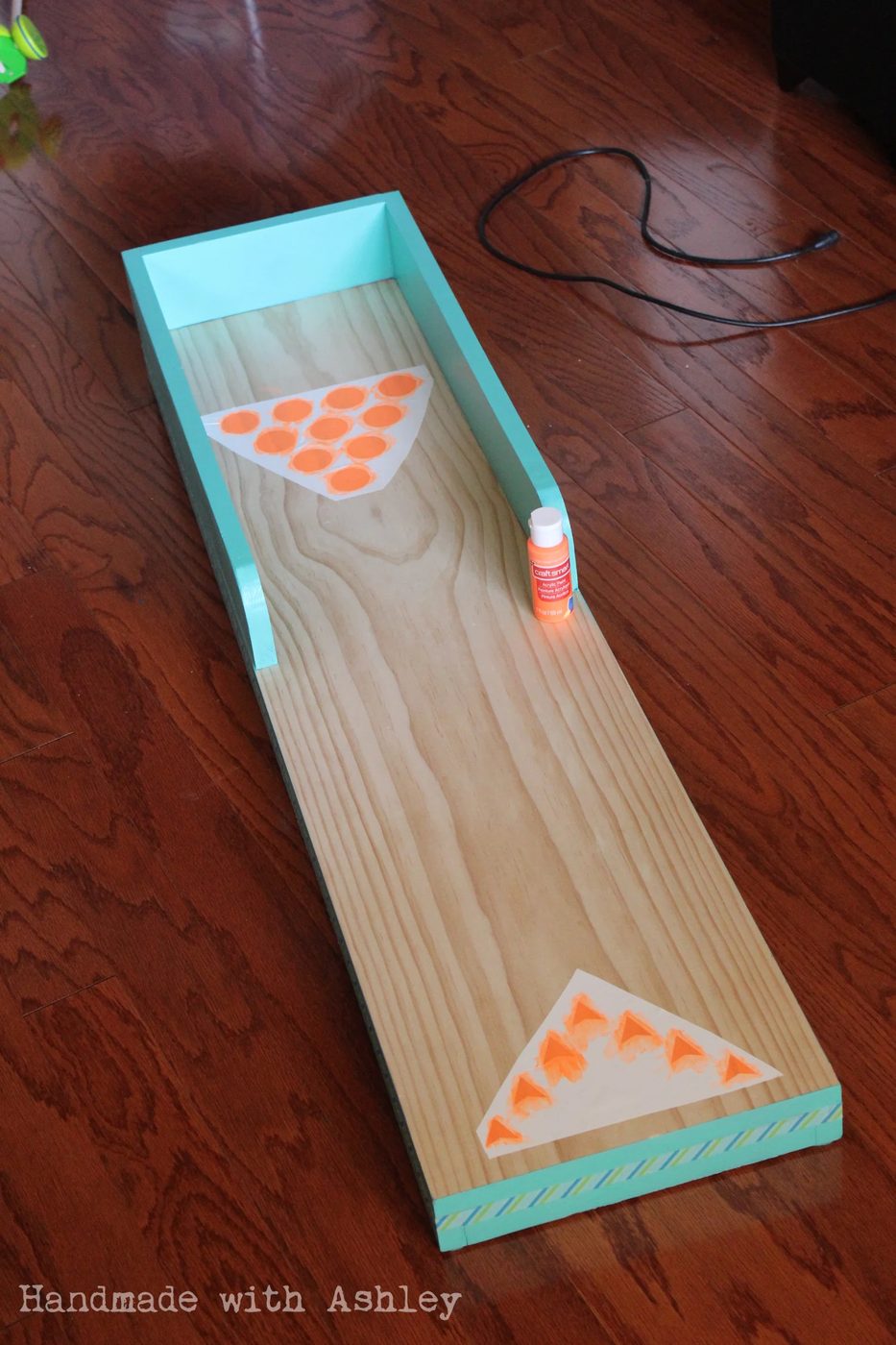 13 Bowling lane pin markers and arrows for silhouette on a kid-sized homemade bowling lane, Handmade by Ashley featured on @Bekob