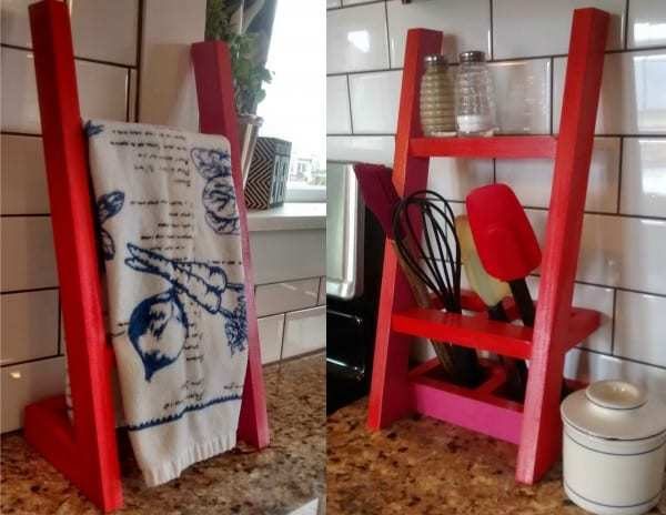 Red Towel Rack And Utinsel Holder Against White Tile Backsplash