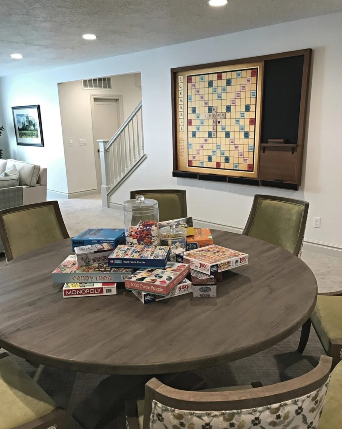 Circle Wood Table With Board Games In Center, Board Game On Wall