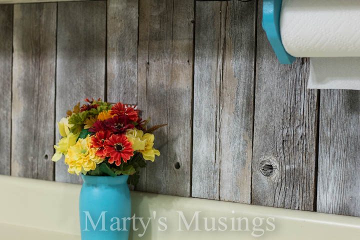 wood kitchen backsplash from reclaimed fence posts