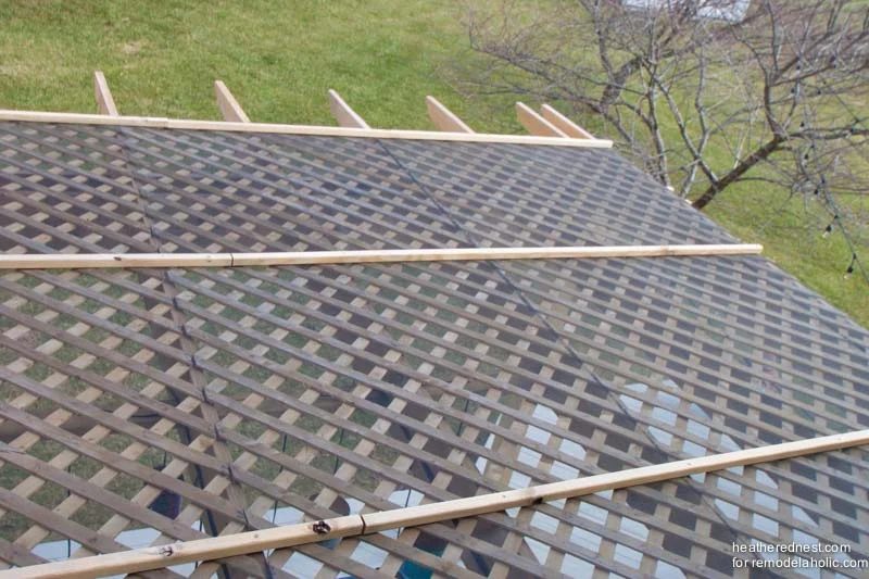 Top view of Handmade deck pergola with lattice and screen to add shade, walkthrough from The Heathered Nest on Bekob.com.