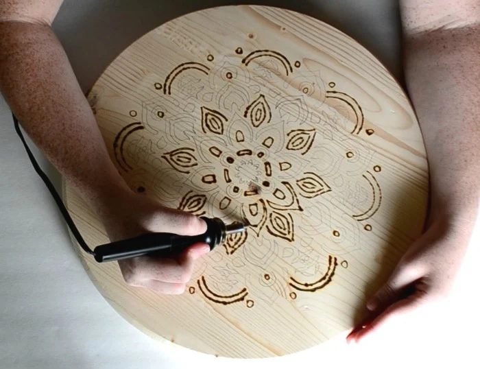 quick-motions-with-wood-burner-utensil