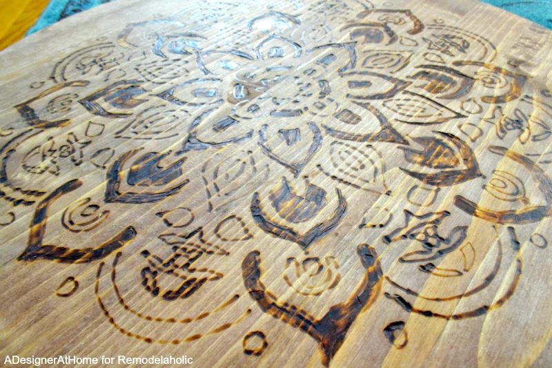 Use a stencil for a great wood-burned design on a planter stand!