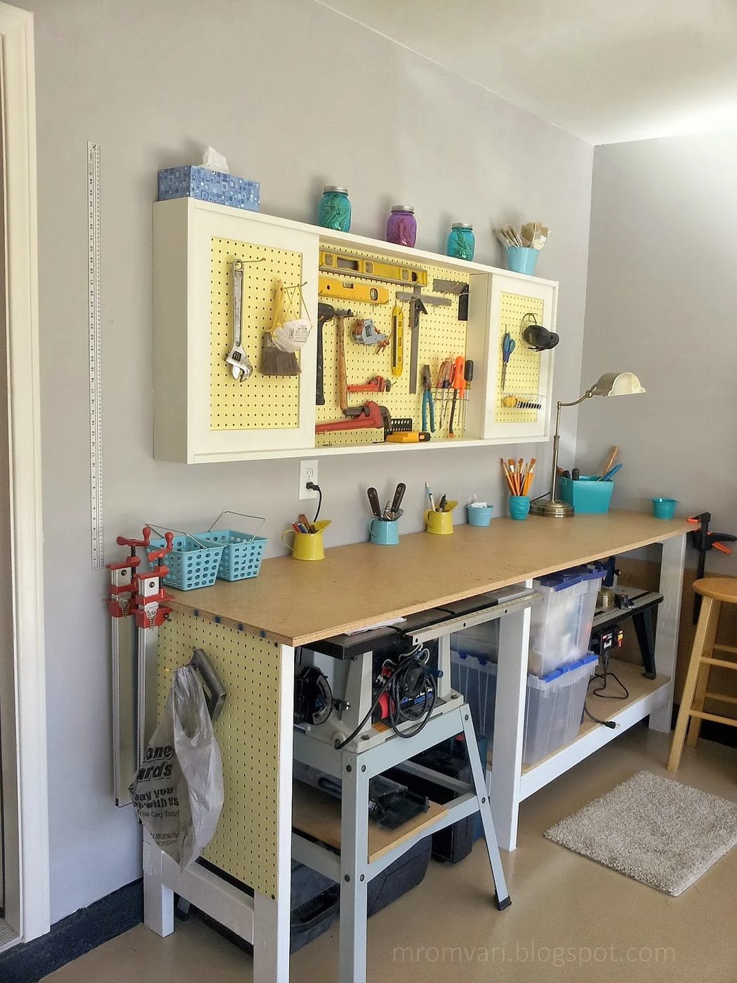 Handmade walkthrough to build a workbench and pegboard tool cabinet with sliding doors, featured on Bekob.com
