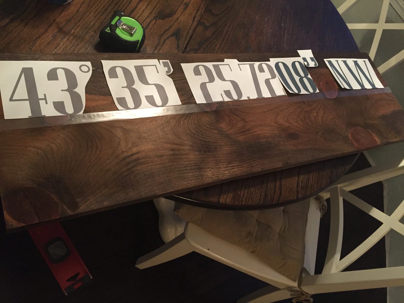 Handmade Reclaimed Longitude/Latitude Sign| Laying out the numbers.