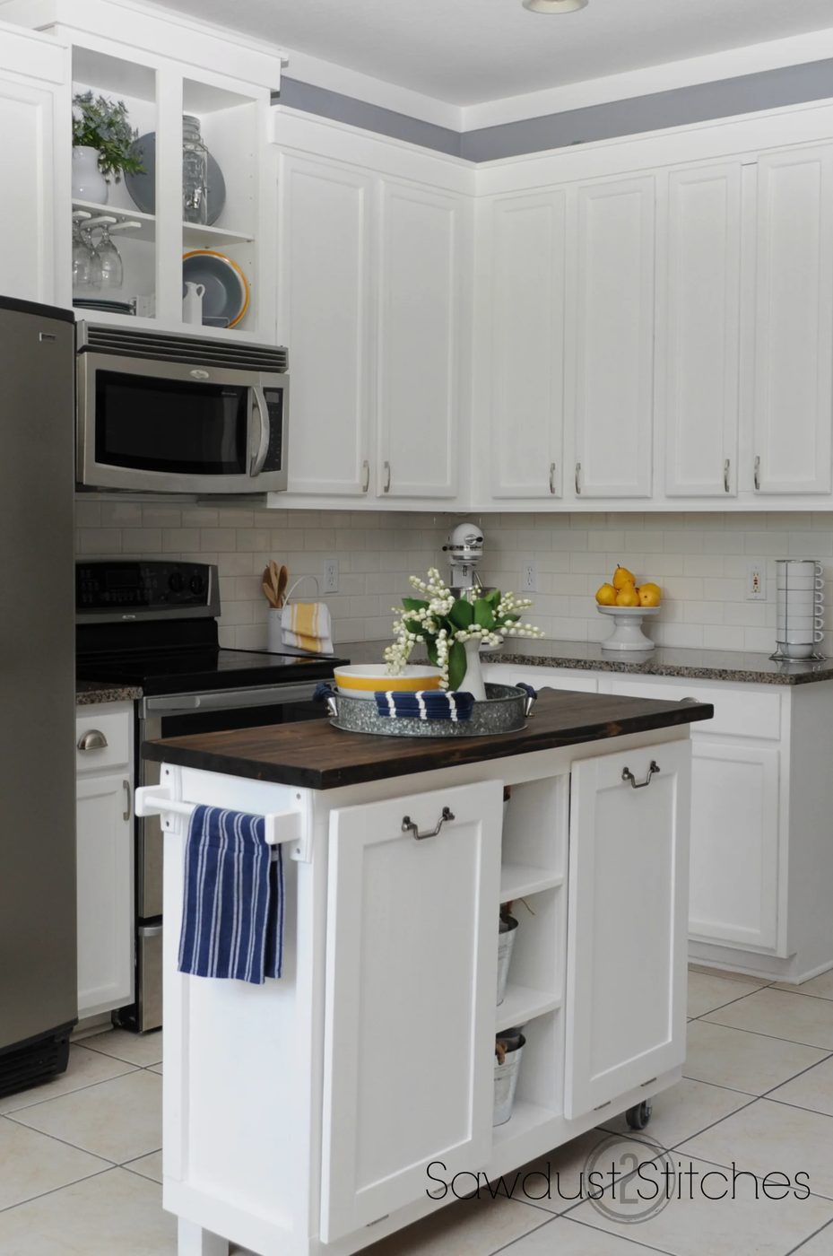 Corey Sawdust2Stitches white painted kitchen cabinets review after a year