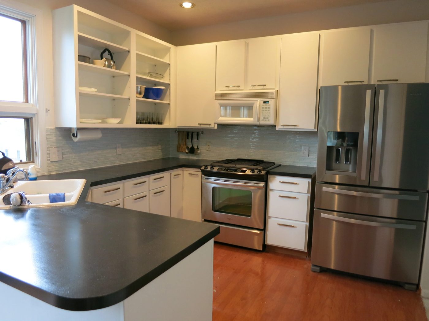 Lauren painted kitchen cabinets after