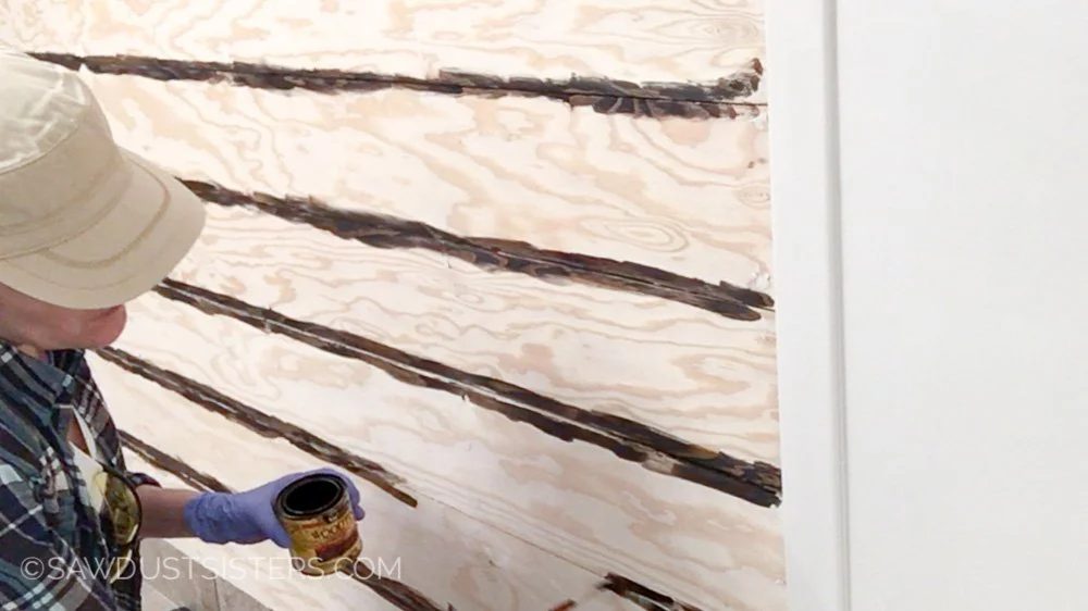 8 How To Create A Distressed Look Using Plywood For A Plank Wall, By Sawdust Sisters Featured On @Bekob