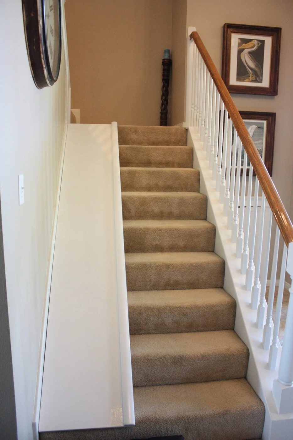 I need this in my house for sure! Handmade stair slide, with a clearly straightforward walkthrough, plus the slide is straightforward to remove if needed for moving furniture up th