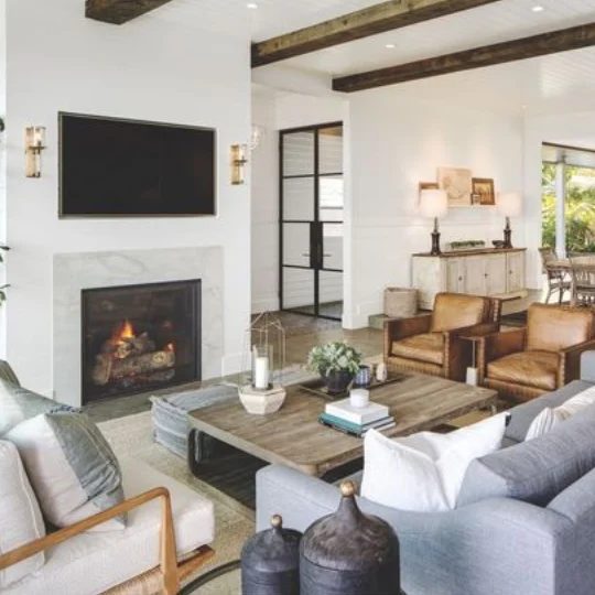 Modern Farmhouse Living Room With Wood Beams In Ceiling