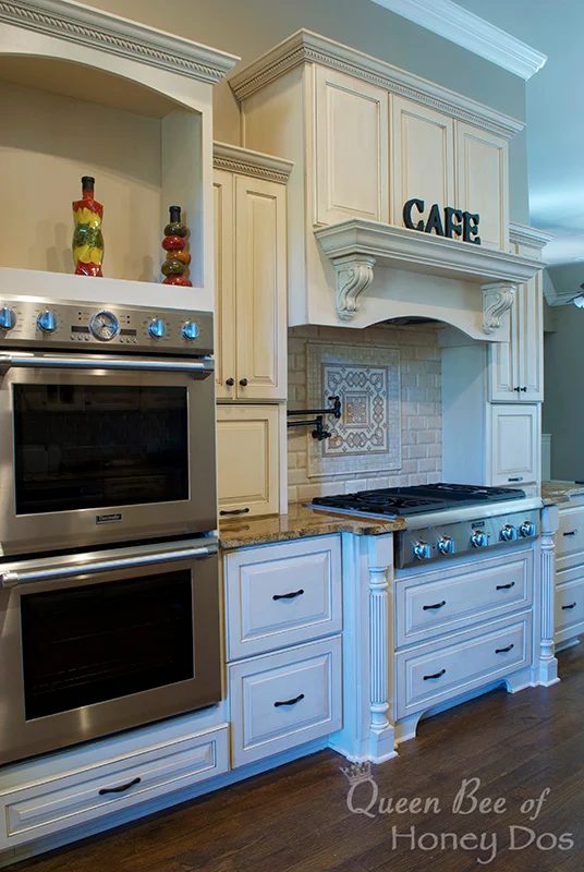 striking white kitchen -- and those drawers have memorable utensil and plate organizers!