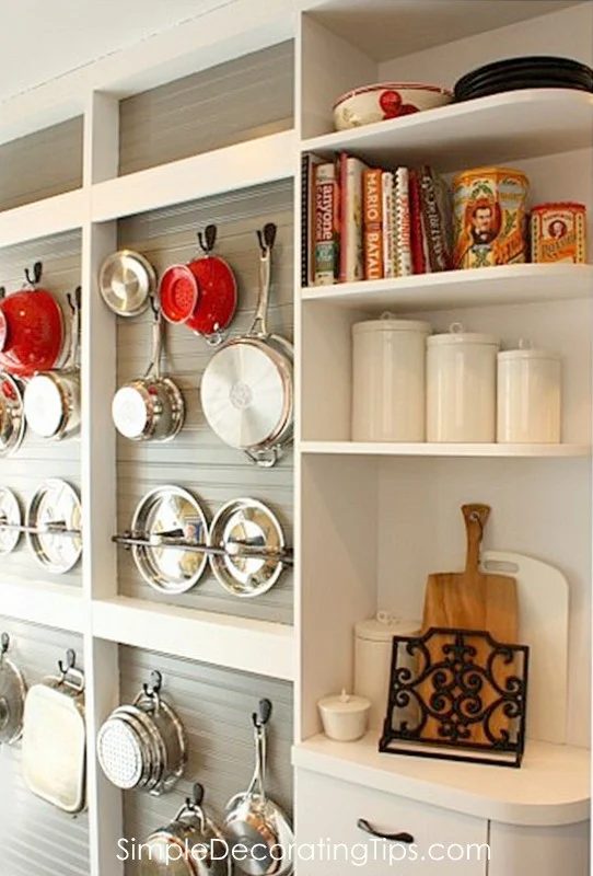 Handmade kitchen remodel with cookware storage built onto the wall by direct Decorating Tips featured on @Bekob