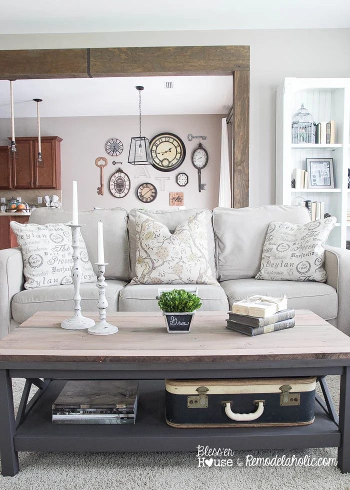 Adding rustic style to a builder grade house, one step at a time -- Bless'er House added a rustic wood doorway for just $80