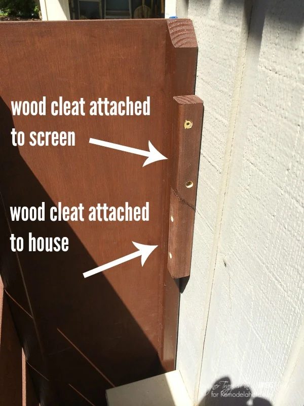 how to build and hang a wood screen to hide utility boxes or other exterior eyesores along the side of your home