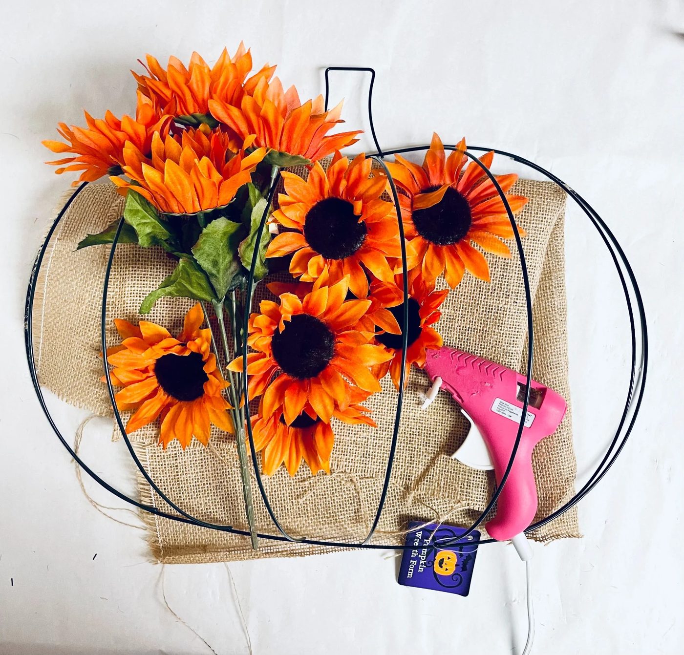 Create a strong Dollar Tree Pumpkin Wreath with Sunflowers