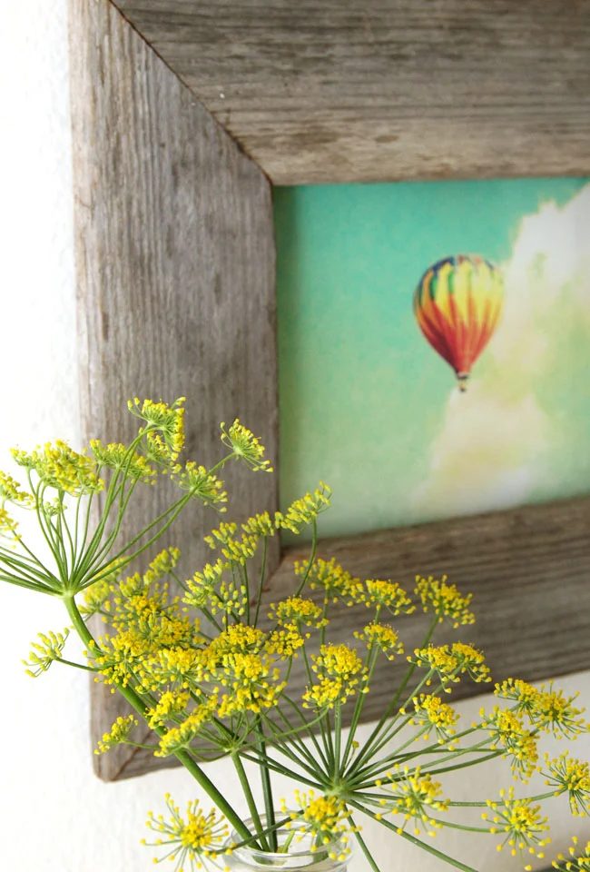Turn a regular photo frame into a reclaimed barn wood photo frame -- so straightforward!