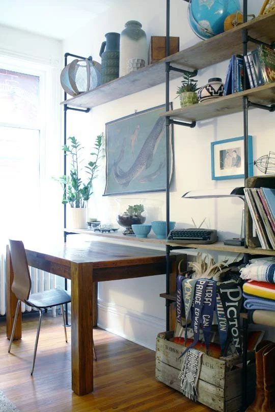 direct industrial wall shelving and home office, Makes Me Smile on Apartment Therapy via Bekob.com