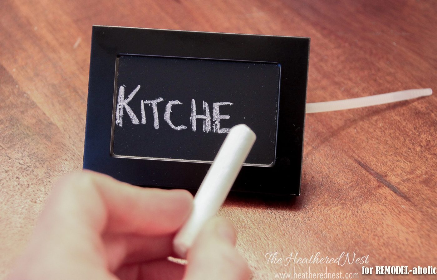 handmade rolling wire bins with chalkboard labels made from picture frames - The Heathered Nest on @Bekob